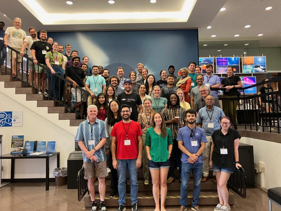 Group photograph of 2025 hackathon participants on staircase of NCAR Mesa Laboratory